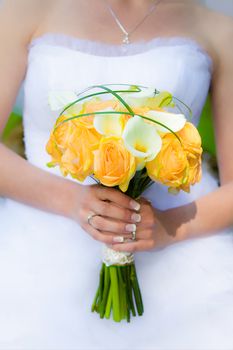 Bride holding a wedding bouquet