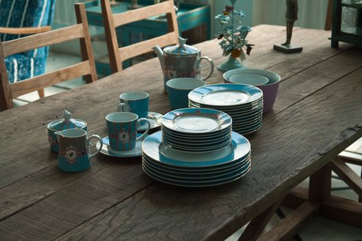 Country style dining room table arranged with traditional dishes