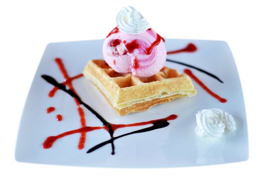 Waffle and whipping cream with strawberry ice cream