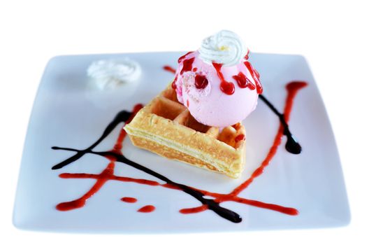 Waffle and whipping cream with strawberry ice cream