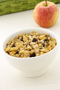 delicious and healthy granola or muesli with a fresh organic apple and lots of dry fruits, nuts and grains. 