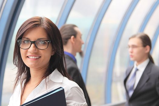Portrait of the beautiful and young business woman