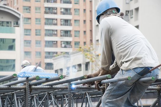 The welders welded reinforcement at construction sites