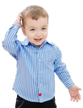 Smiling boy on a white background, scratching his head