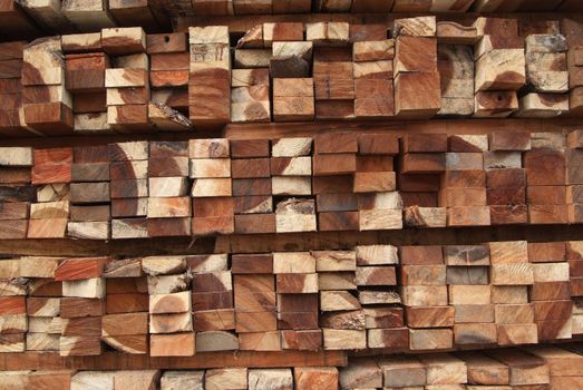 A pile of cut wood for construction ( texture, background, pattren)