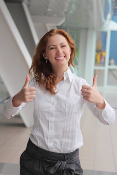 Portrait of the beautiful and young business woman