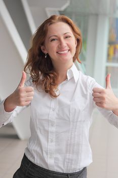 Portrait of the beautiful and young business woman
