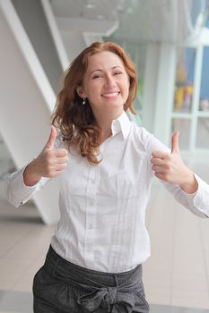 Portrait of the beautiful and young business woman