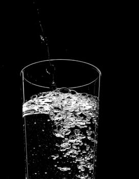 food series: pouring clear water in the glass