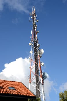 Pole with a variety of transmitters. Radio broadcasting and mobile communications and other modern technology.