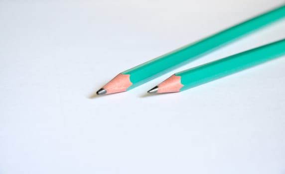 isolated two pencils on white close up