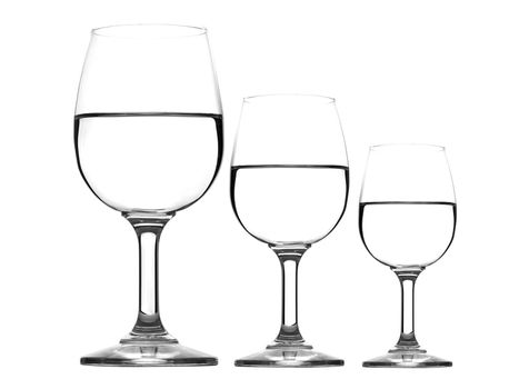 Three wine glasses with water isolated on white
