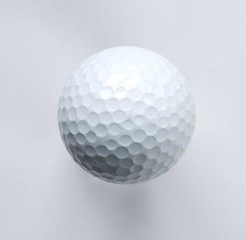 White golf ball isolated on white background
