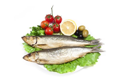 Smoked sprat-appetizing snack with tomato and lemon
