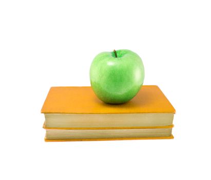 book with apple isolated on white background
