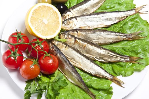 smoked fish served with tomato fennel and lemon