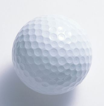 Golf ball isolated on white with shadow