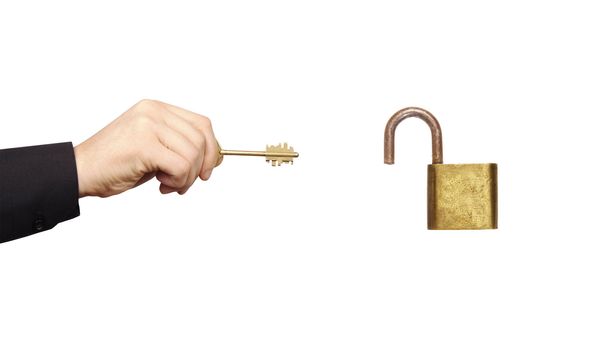 Businessman's Hand Holding Key
