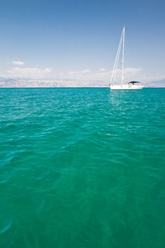 White boat on a calm sea horizon, seascape