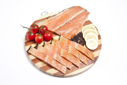 fresh salmon on a cutting board isolated
