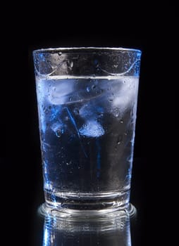 Empty glass with ice cubes