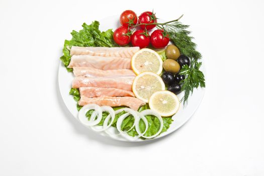 raw red fish on white plate