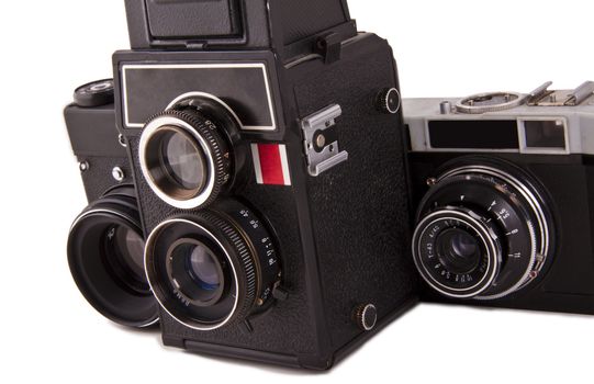 three old cameras