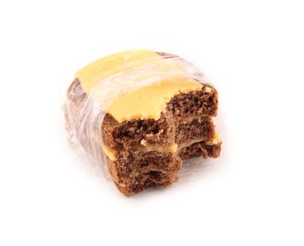 bitten bread and cheese isolated