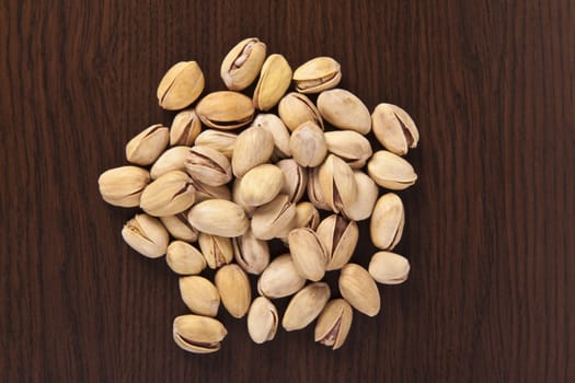 shelled pistachio on wooden