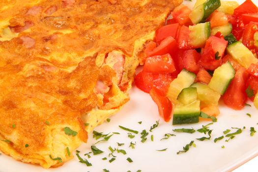 Bacon omelet with vegetables close up