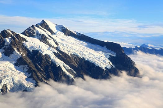 landscape of Mount cook with sea of mist from helicopter