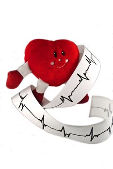 Photo of plush heart and its cardiogram
