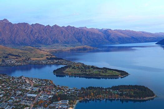 closeup of queenstown with lake Wakatipu from top at dusk.