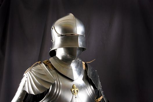 Armour of the medieval knight. Metal protection of the soldier against the weapon of the opponent