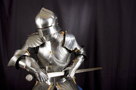 Armour of the medieval knight. Metal protection of the soldier against the weapon of the opponent