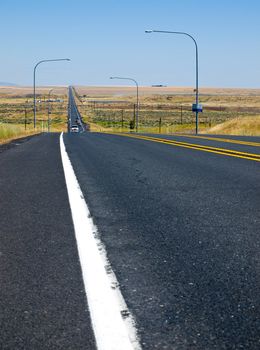 Straight Line Highway in the Country on a Clear Sunny Day