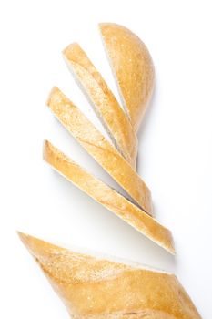 Fresh baguette, sliced, isolated on white background