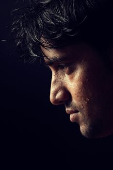 Grains & textures are added in the portrait of Indian man over dark background