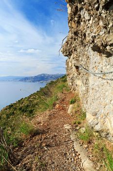 pathway equipped with chains in Portofino Natural Park, Italy