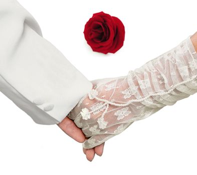 Close-up Holding Hands with red rose