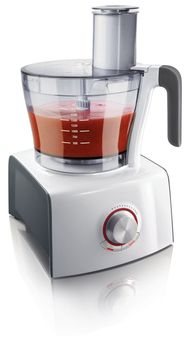 Blender with red fruit smoothie isolated on white background.