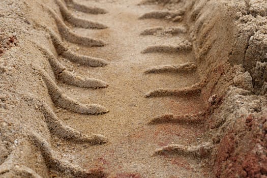 Tire Tracks in the Sand