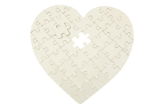 heart made from the puzzle on white