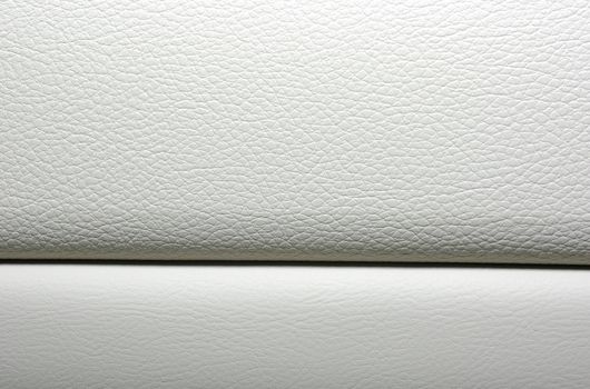 White leather background. Modern japanese car interior materials.
