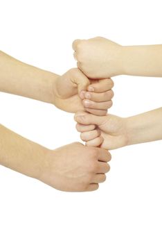  clenched fists building a tower on white