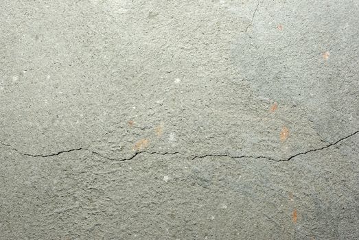 Damaged concrete wall close up photo. Abstract construction background.