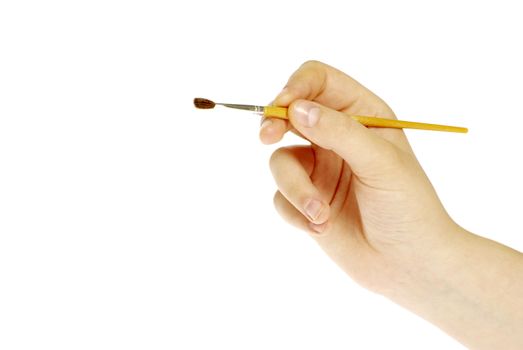 Isolated photo of a brush in a hand