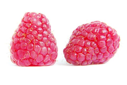 Ripe raspberry on a white background