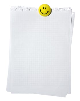 Empty pages from spiral notebook stackes with yellow smiling magnet. Isolated on white background. Clipping path.