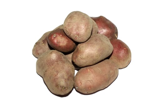 Stack of brown with red potatos isolated on white background.